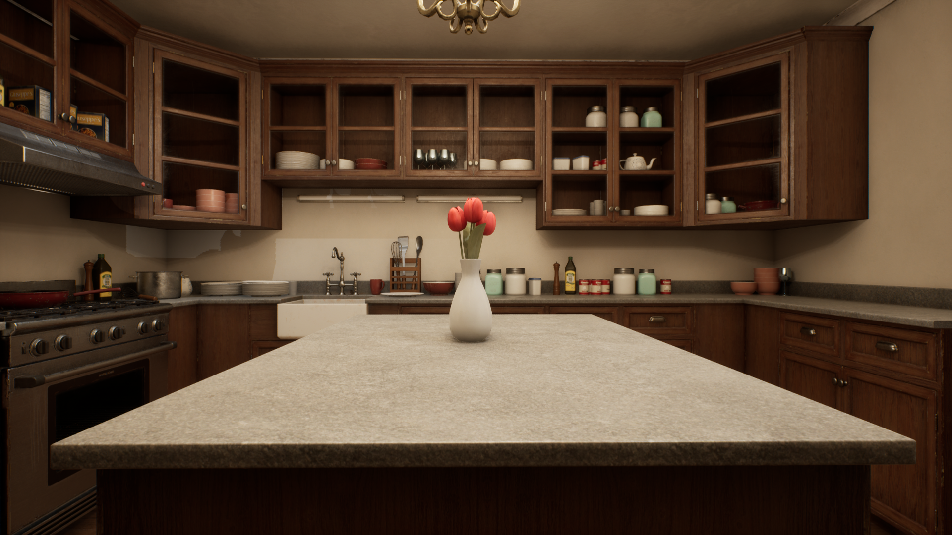 A kitchen island with a vase of tulips.